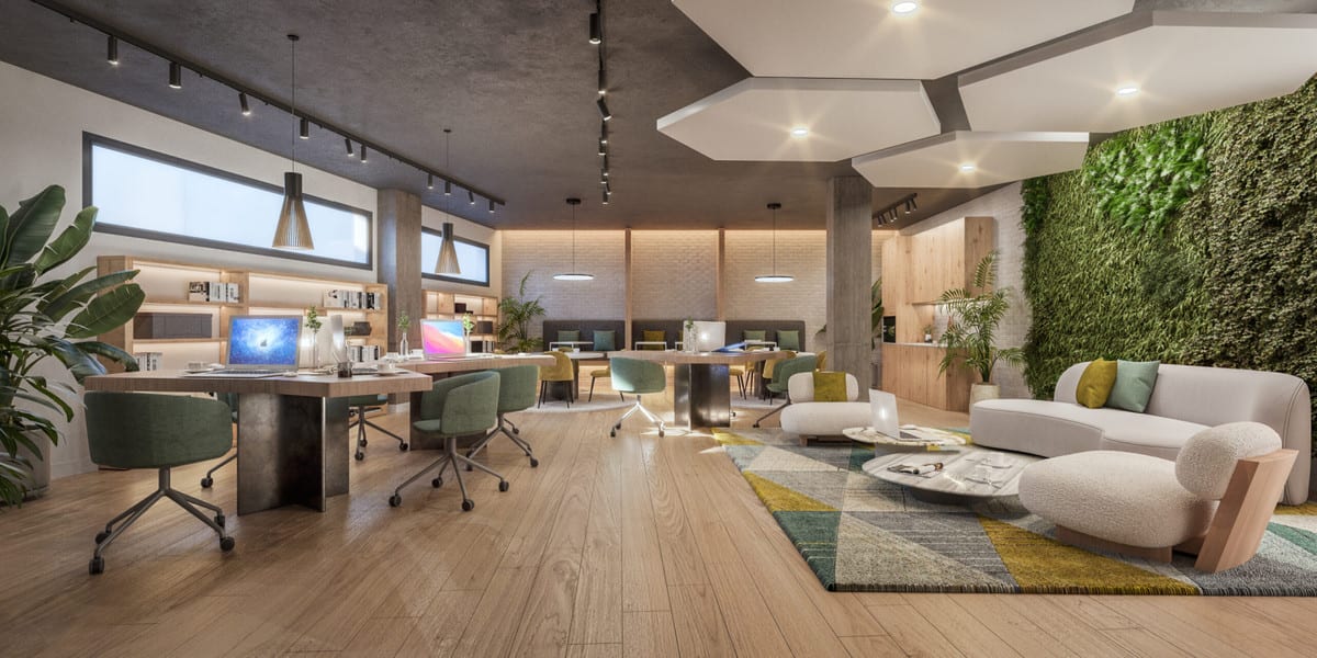 Project visualisation of ORIGIN featuring an open-plan space with wooden flooring, work tables with green office chairs and computer screens, a lounge seating area with a white sofa and armchair on a colourful rug, and a planted green wall.