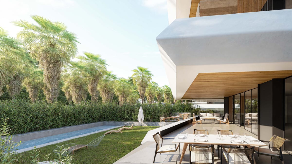 Rendered outdoor visualisation of PALM RESIDENCES with a covered terrace featuring a dining table and chairs, a narrow swimming pool with sun loungers on the lawn, a dense green hedge and a row of palm trees in the background.