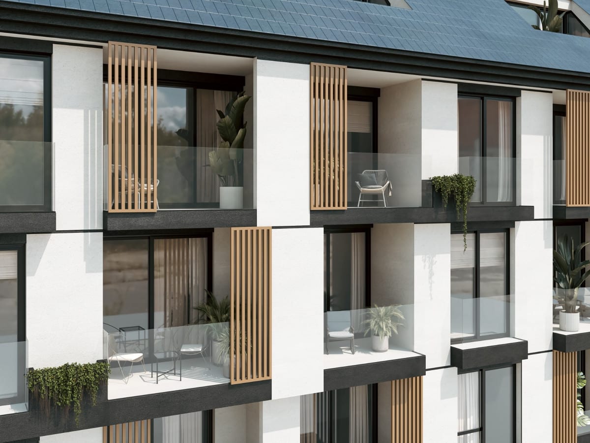 Project visualisation of PELIT MARITIMO with a close-up of several balconies featuring glazed front panels, dark frames, white façade surfaces, vertical wooden slats and green planting on the balconies.