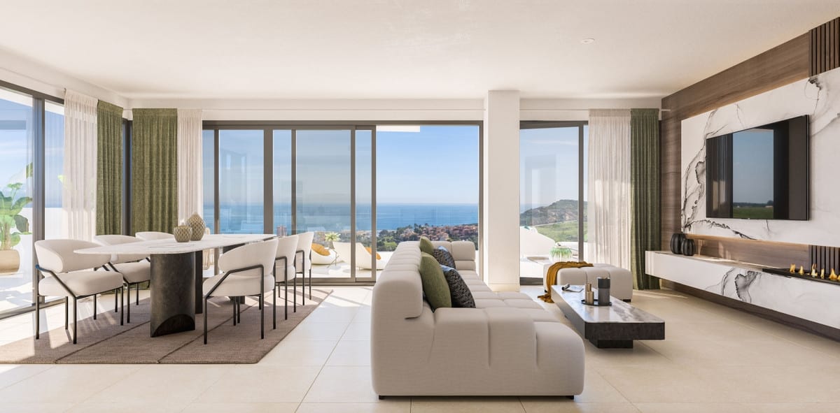 Project visualisation of the living and dining area at PURE SUN II with a light grey sofa, oval dining table, glass sliding doors and a feature wall with a television and linear fireplace.