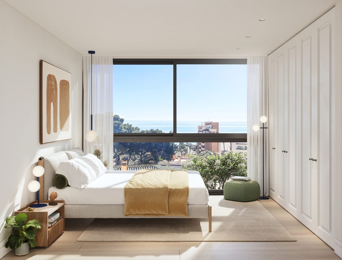 Bedroom render with white fitted wardrobes and a large window showing the sea beyond.
