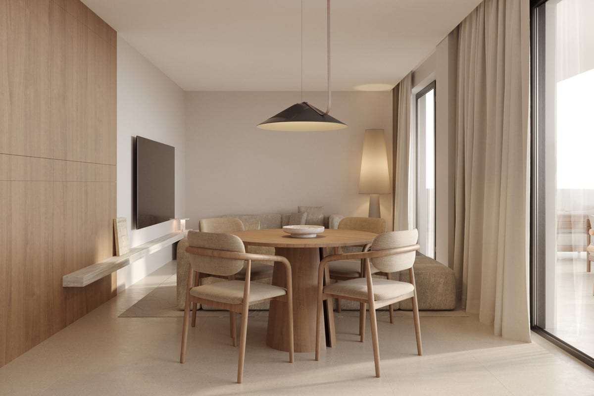 Rendered dining area at RAYOS DEL SOL with a round wooden dining table, four upholstered wooden chairs, a dark conical pendant light, wooden wall panelling with a wall-mounted television and a seating area with sofa in the background.