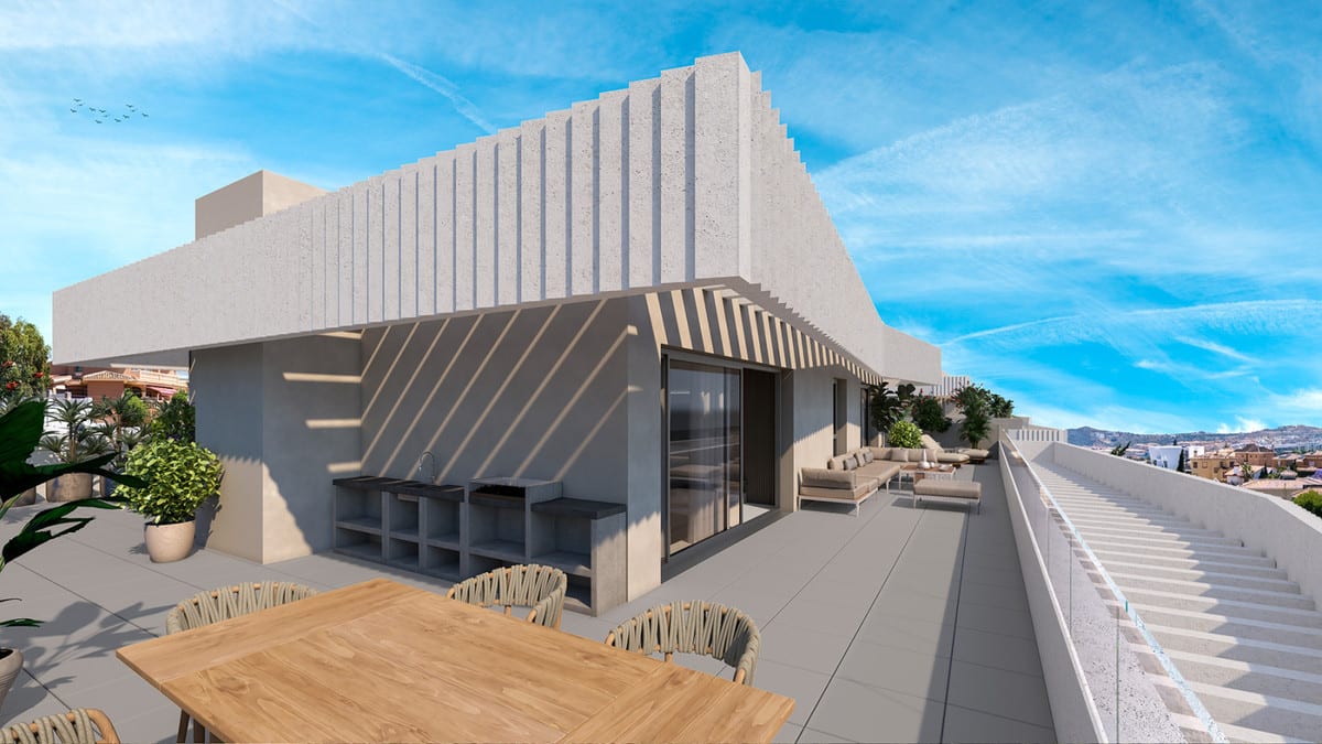 Development visualisation of a spacious outdoor terrace at RESIDENCIAL COTO HOMES with a wooden dining table, chairs, built-in outdoor kitchen, lounge furniture and a solid white terrace edge.