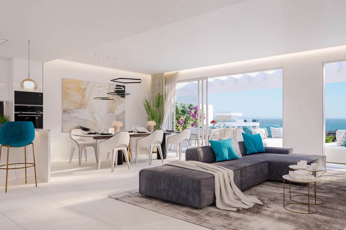 Project visualisation of ROYAL PALMS MIJAS featuring a dark corner sofa, open-plan kitchen with blue bar stools, dining table and sliding doors leading to a furnished terrace.