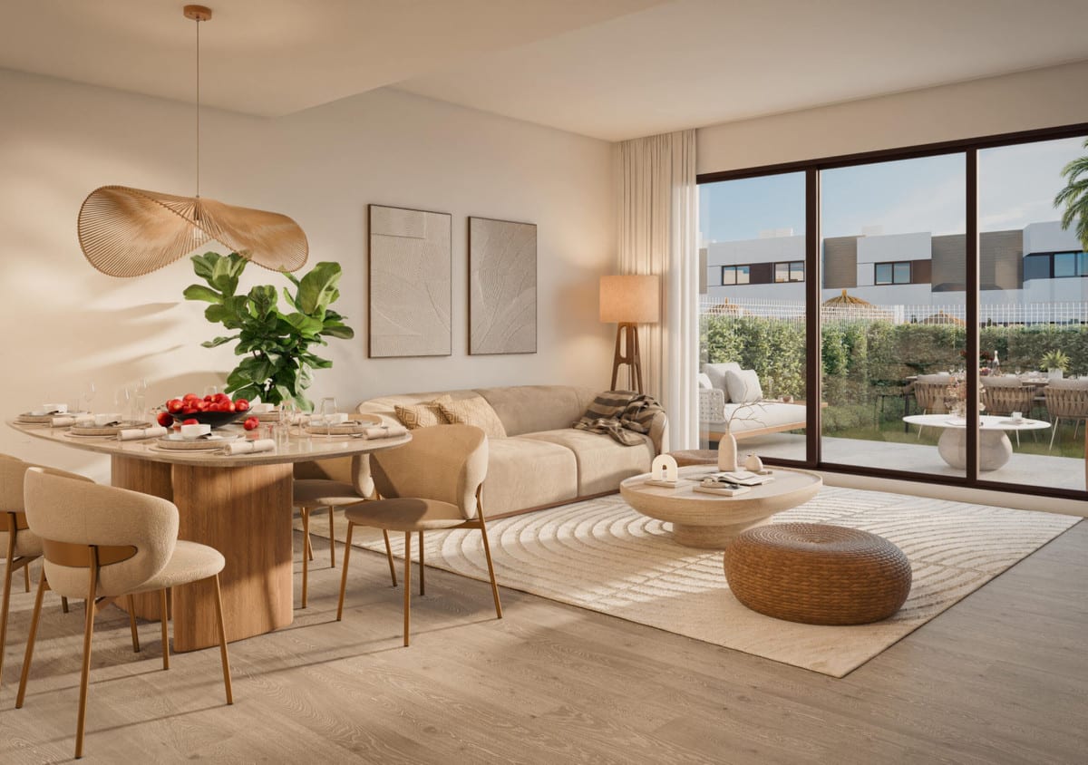 Rendered interior visualisation of SAVIA - FASE 2 with a round wooden dining table, beige chairs, beige sofa, woven pouffe and sliding glass doors opening onto a terrace with garden.