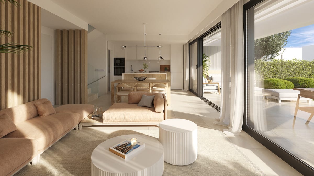 Project visualisation of SERENE ATALAYA II / III featuring a seating area, timber slatted wall, round coffee tables, dining table and open-plan kitchen beside glass sliding doors.