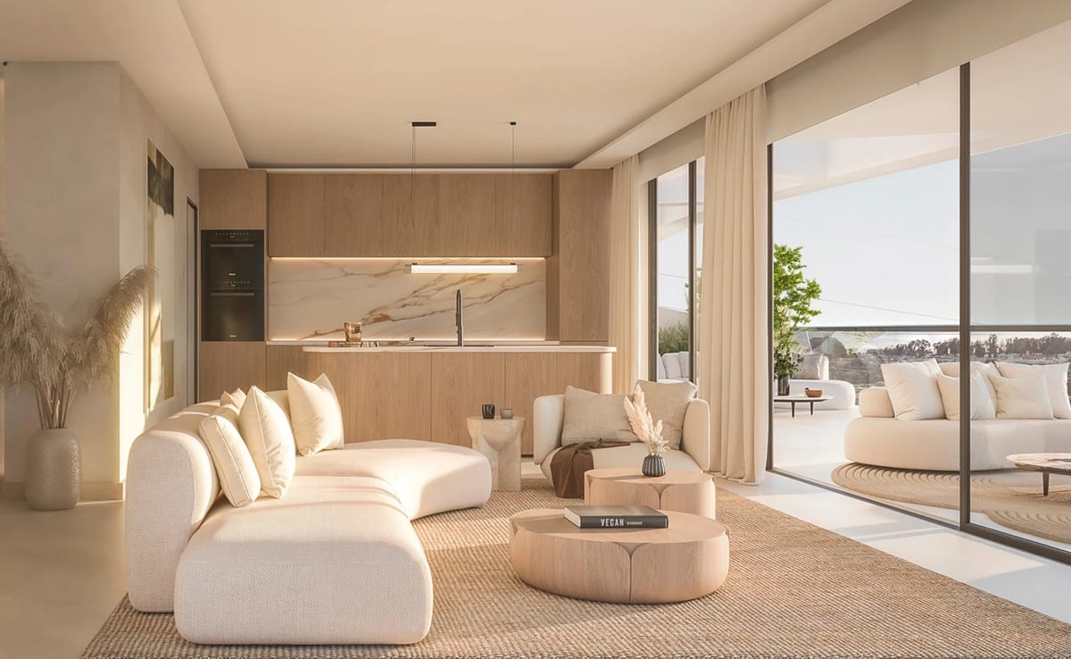 Project visualisation of SOLAIA featuring a living room, an open-plan wood-toned kitchen with a marble-look splashback, and large sliding glass doors leading to a terrace with outdoor seating.