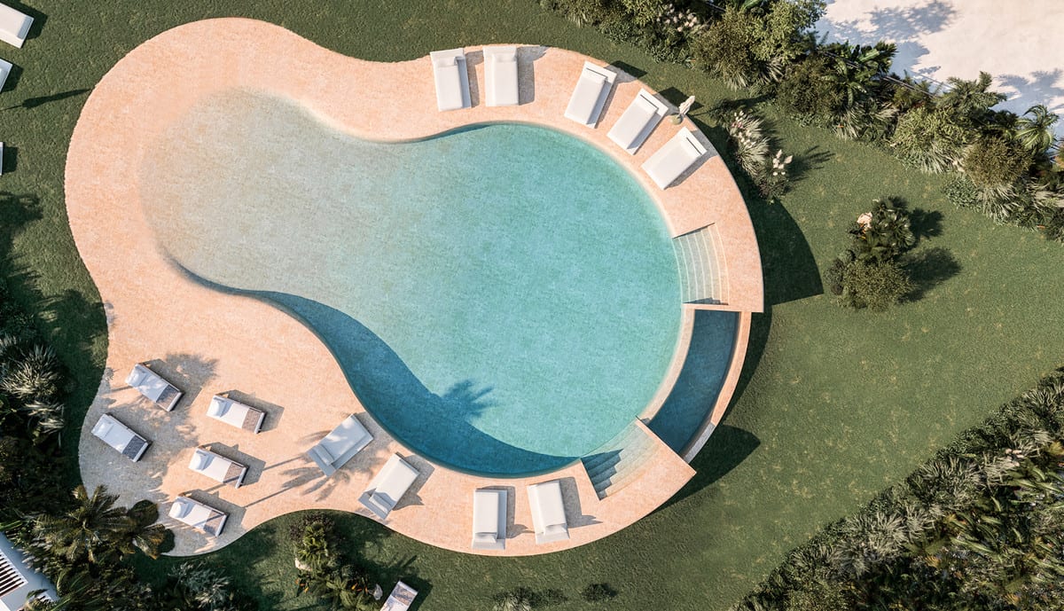 Project visualisation of SOLAIA featuring an organically shaped light-blue swimming pool, a terracotta-coloured terrace surround, white sun loungers and surrounding greenery with palm trees, viewed from above.