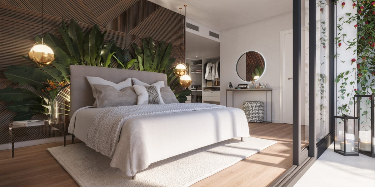 Rendered bedroom interior visualisation of SOLEIA LIVING with a double bed, geometric layered wooden feature wall, tropical foliage plants, gold globe pendant lights and a sliding glass door.