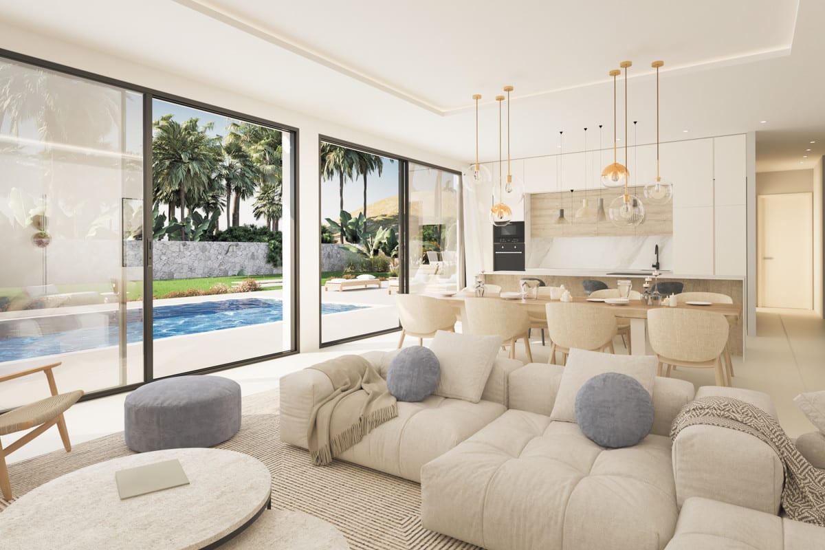 Rendered open living space combining seating, dining and kitchen areas.