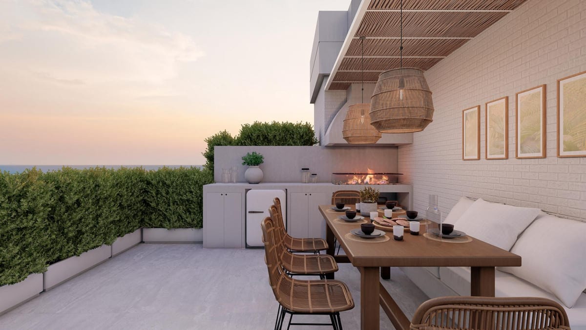Rendered terrace visualisation of TERRAZAS DE GUADAIZA II with a wooden dining table, rattan chairs, built-in outdoor fireplace, rattan pendant light and wooden slatted ceiling.