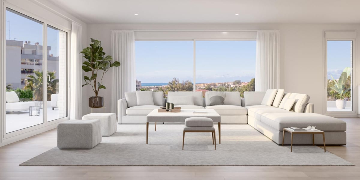 Rendered living room visualisation of TERRAZAS DE GUADAIZA II with a light corner sofa, large grey rug and wide sliding glass doors.