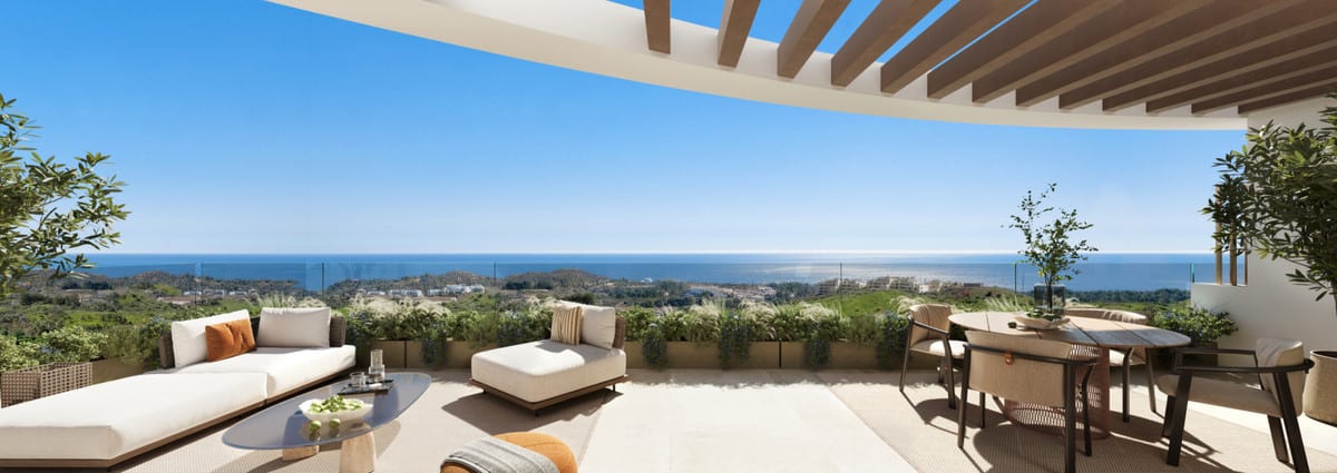 Project visualisation of a terrace at THE EAGLE RESIDENCES with a wooden pergola, lounge sofa with pouffe, round coffee table, dining table with chairs, planters and a rendered sea horizon in the background.