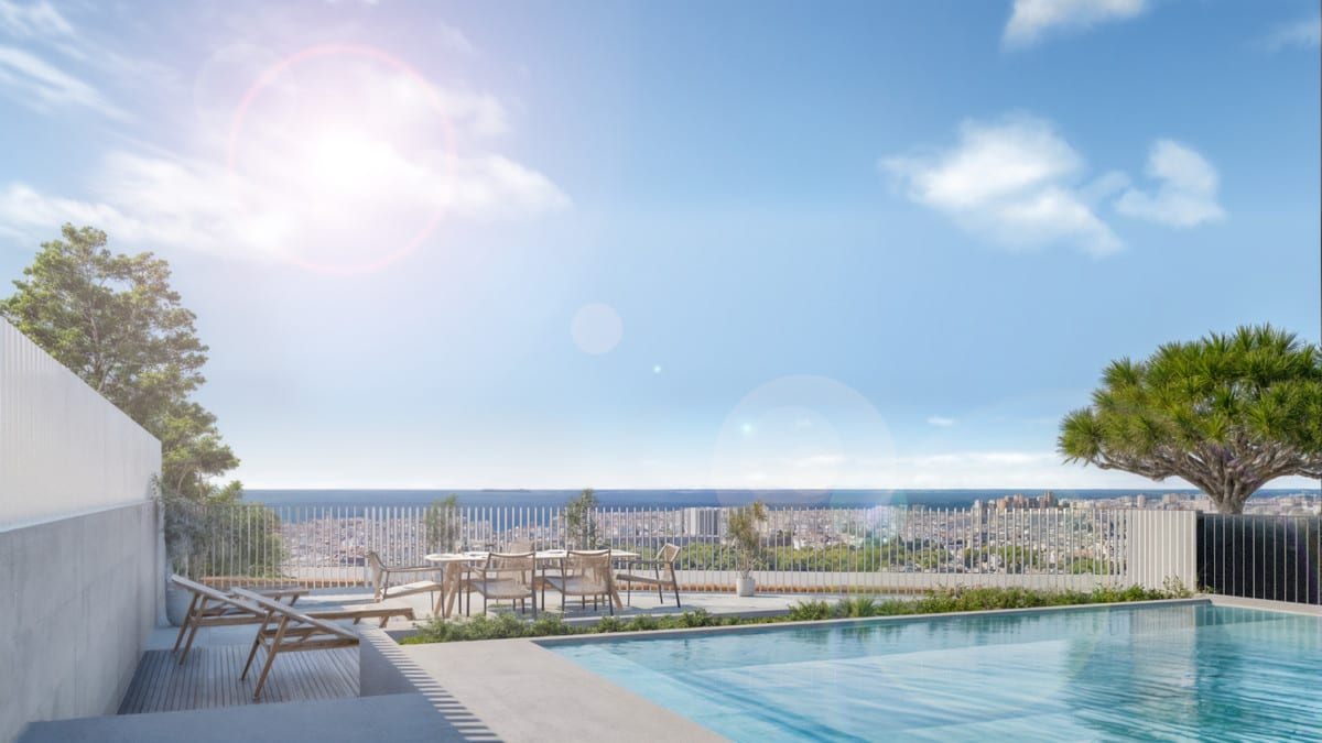 Project visualisation of THE OAK 48 with a swimming pool, a wooden sun lounger, a round dining table with four chairs on the terrace and the sea visible on the horizon.