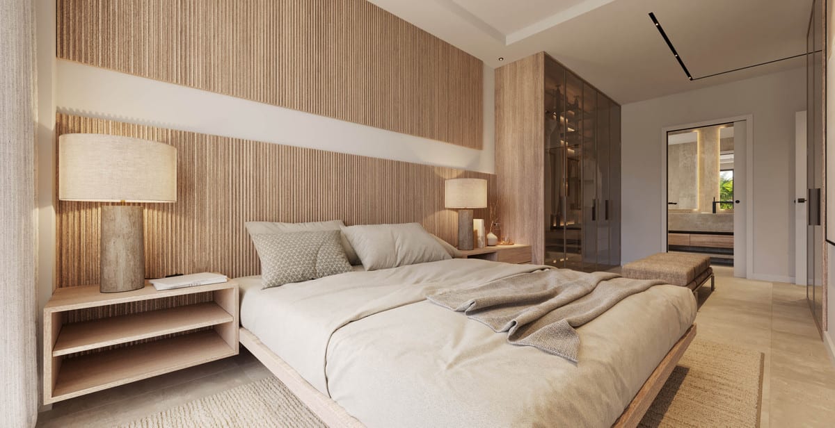 Project visualisation of THE PALMS AT ESTEPONA featuring a bedroom with a double bed, wooden slatted feature wall, glass-fronted wardrobe wall and an open passage to a lit room with a mirror.