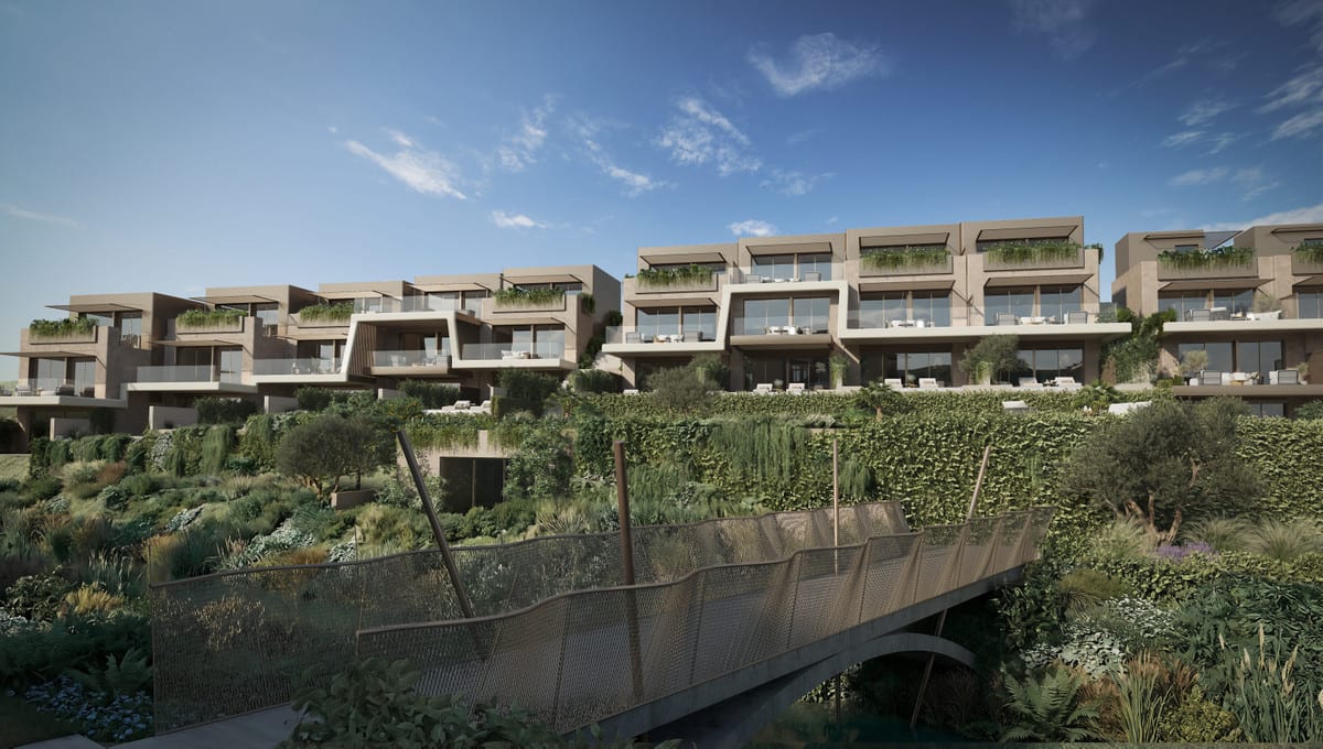 Wide exterior render of the residences beyond a footbridge and planted slope.