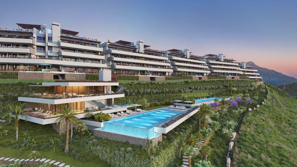 Project visualisation of TIARA with stepped white buildings on a hillside, wide terraces with wooden canopies, a large rectangular swimming pool in the foreground, lush planting and a mountain silhouette against a pastel twilight sky.