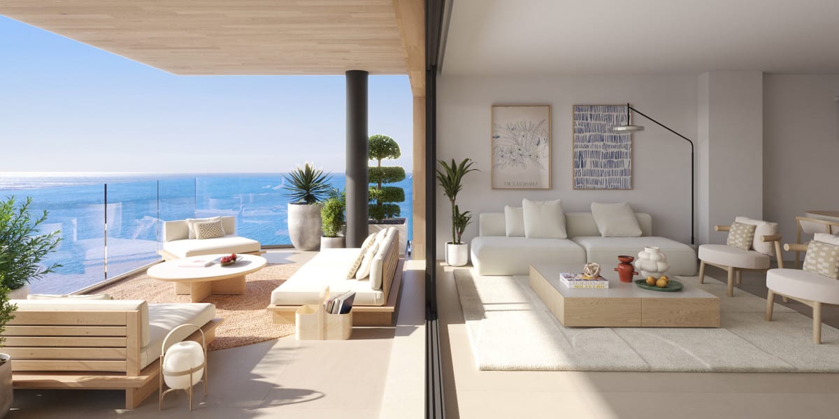 Rendered living room and terrace view of TORRE BIZNAGA with white sofas, a wooden coffee table, glass balustrade on the terrace and sea in the background.