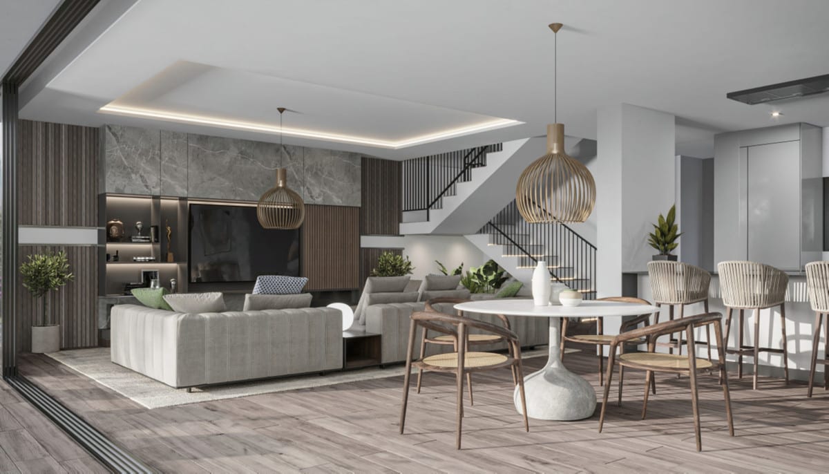 Project visualisation — VILLA AZAHAR PRIVÉ: Open living and dining space with a round dining table, wood panels, a staircase and a kitchen counter.