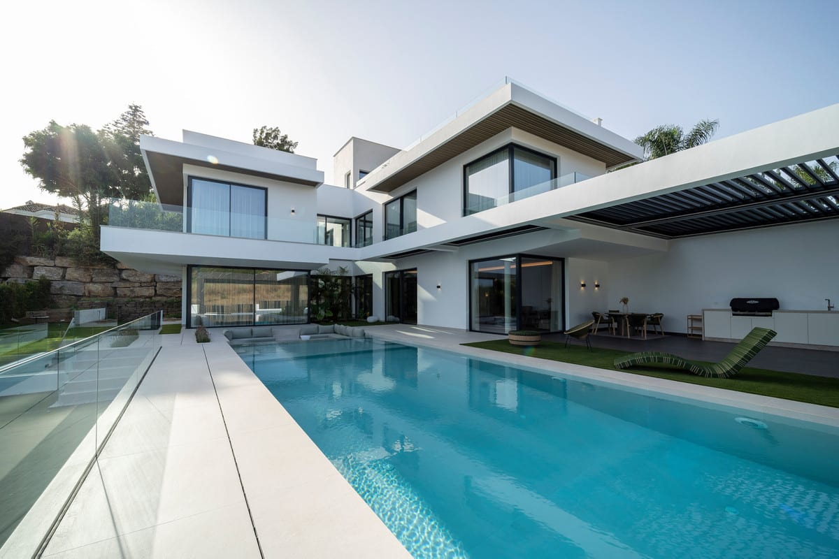 Project visualisation of VILLA ESMERALDA with exterior architecture, terraces and landscaped outdoor space.
