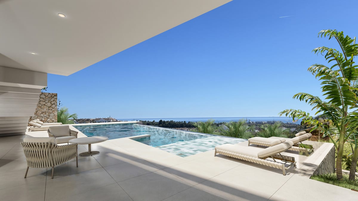 VILLA EVANIA CORTESÍN: Poolside terrace with seating.