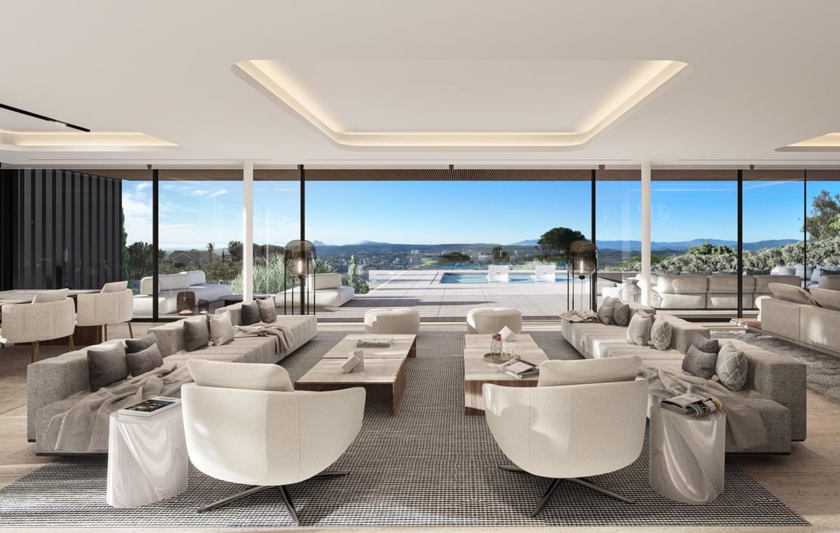 Living-room visualisation at VILLA RETIRO - THE COLLECTION with low seating groups and broad glazing towards the terrace and pool.