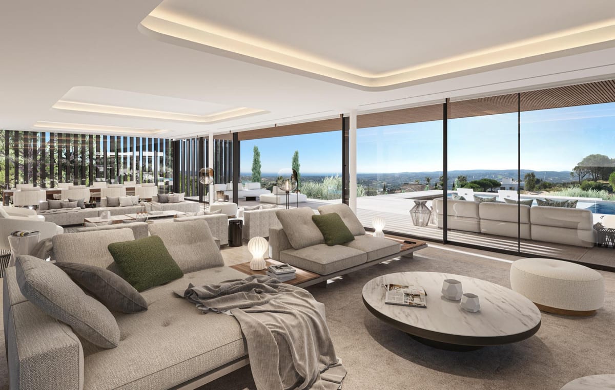 Visualisation of a lounge at VILLA RETIRO - THE COLLECTION with grey upholstery, green accents and sliding glass doors towards the terrace.