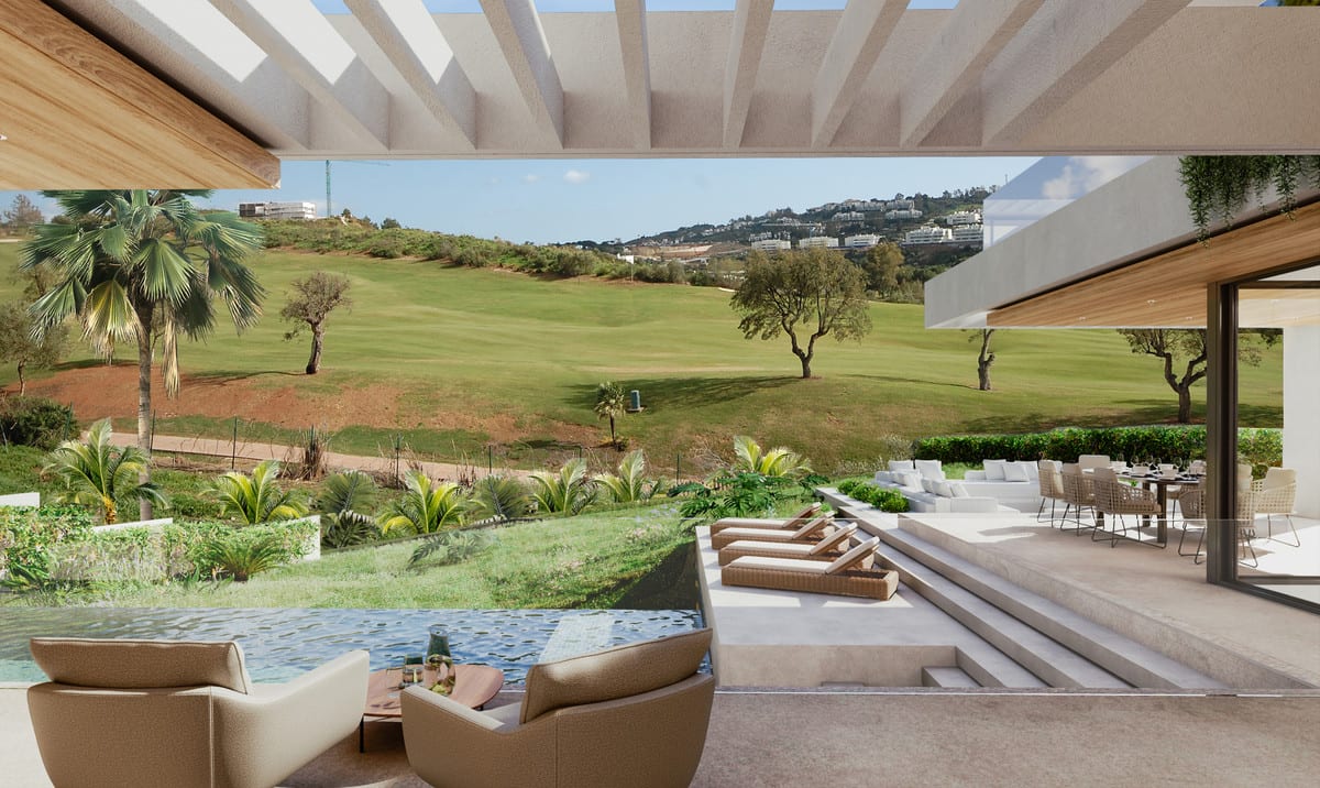 Visualisation of the pool terrace with sun loungers, an outdoor dining area and views over green surroundings.