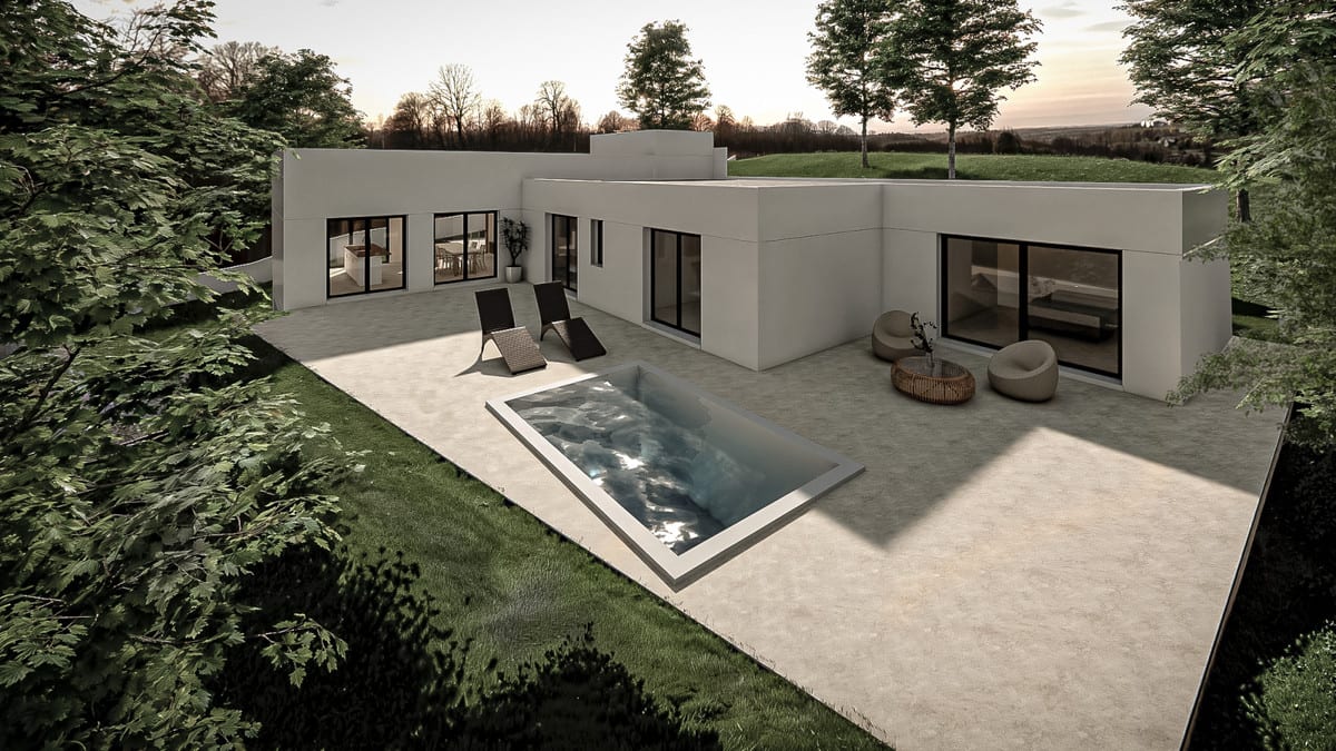 Elevated view of the villa with pool, sun loungers and a terrace surrounded by greenery.