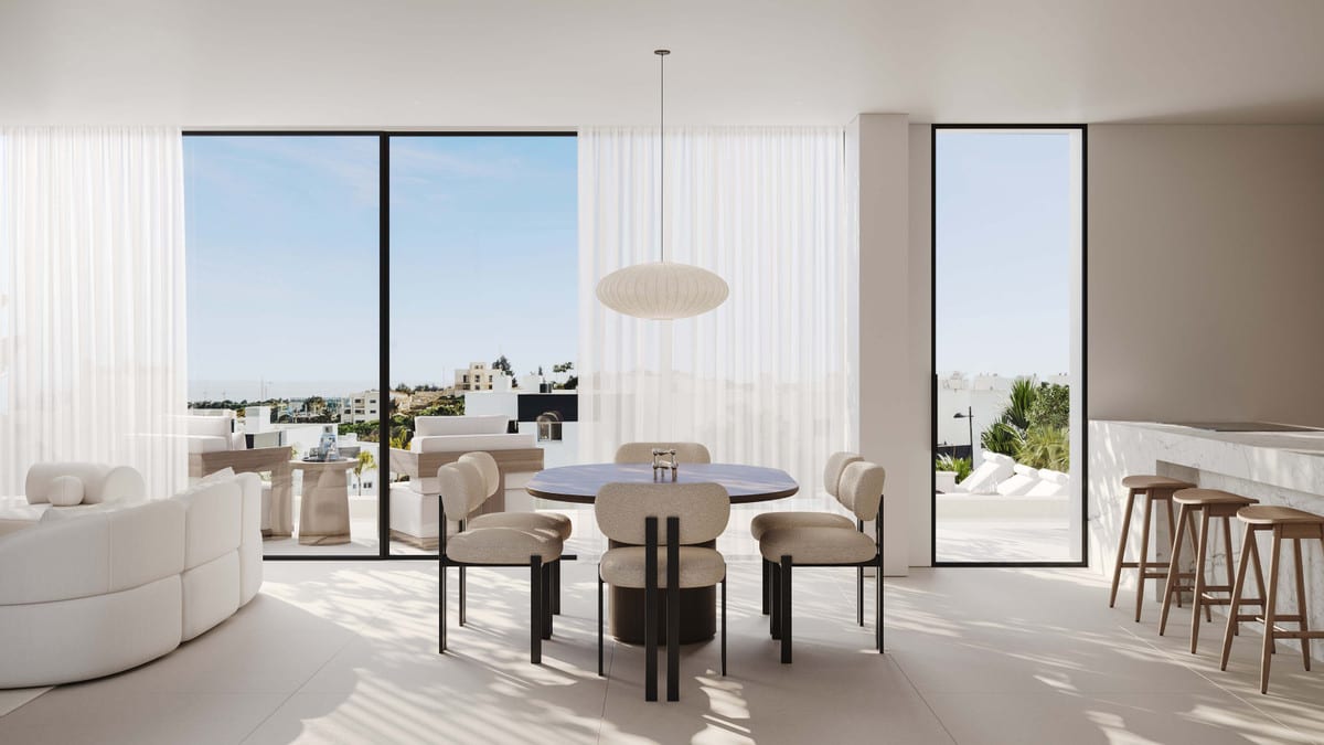 Interior visualisation with dining area, seating and breakfast bar in light tones.