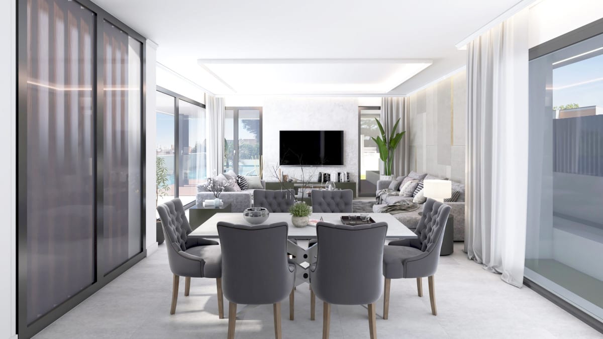 View from the dining area towards the lounge, with sliding doors and curtains.