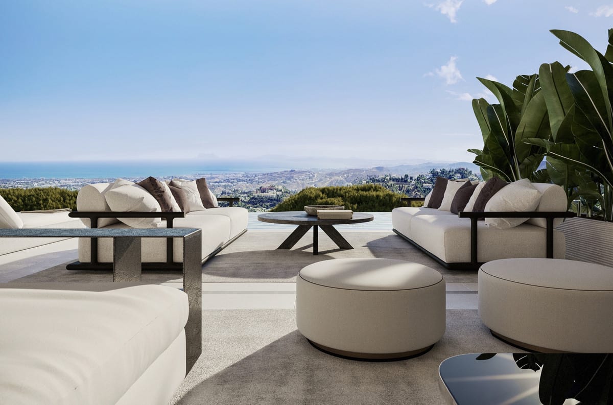 Terrace visualisation of VISTA LAGO RESIDENCES with cream lounge seating, round ottomans and views over the hills towards the sea.