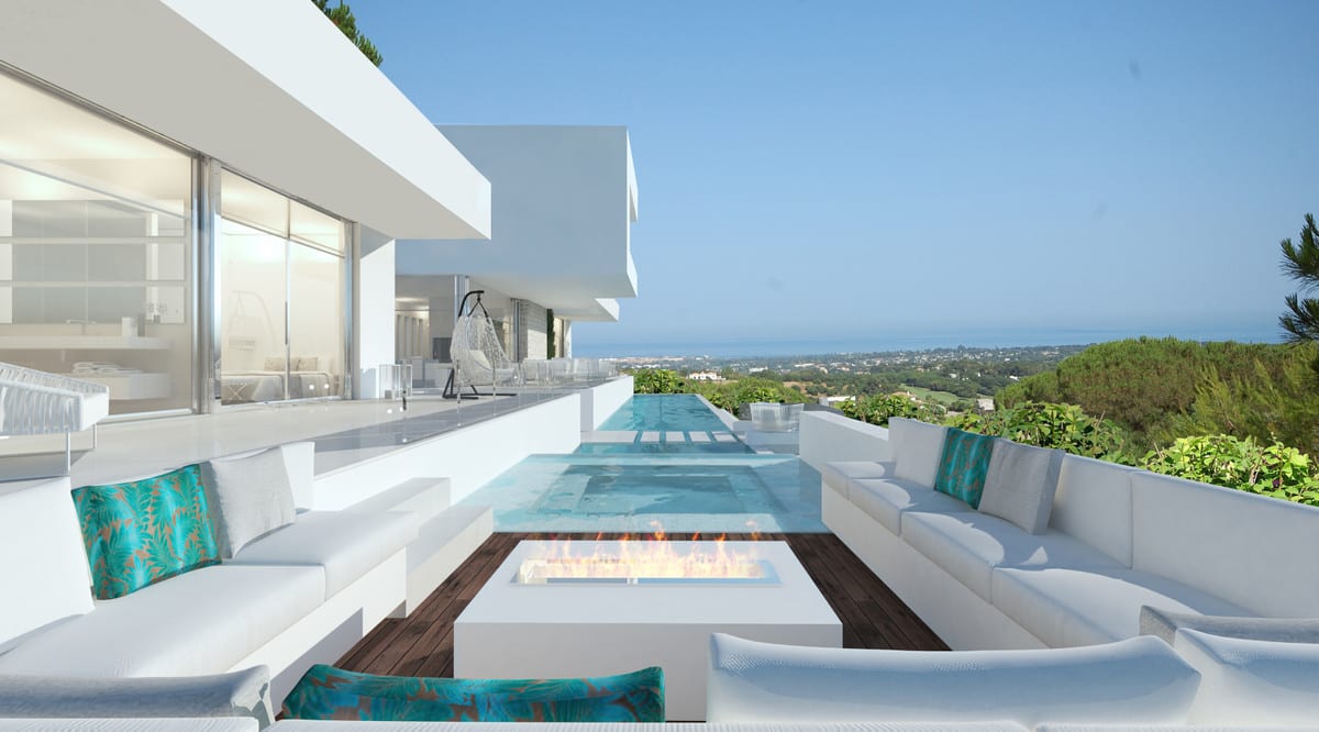ZOE: Poolside terrace with seating.