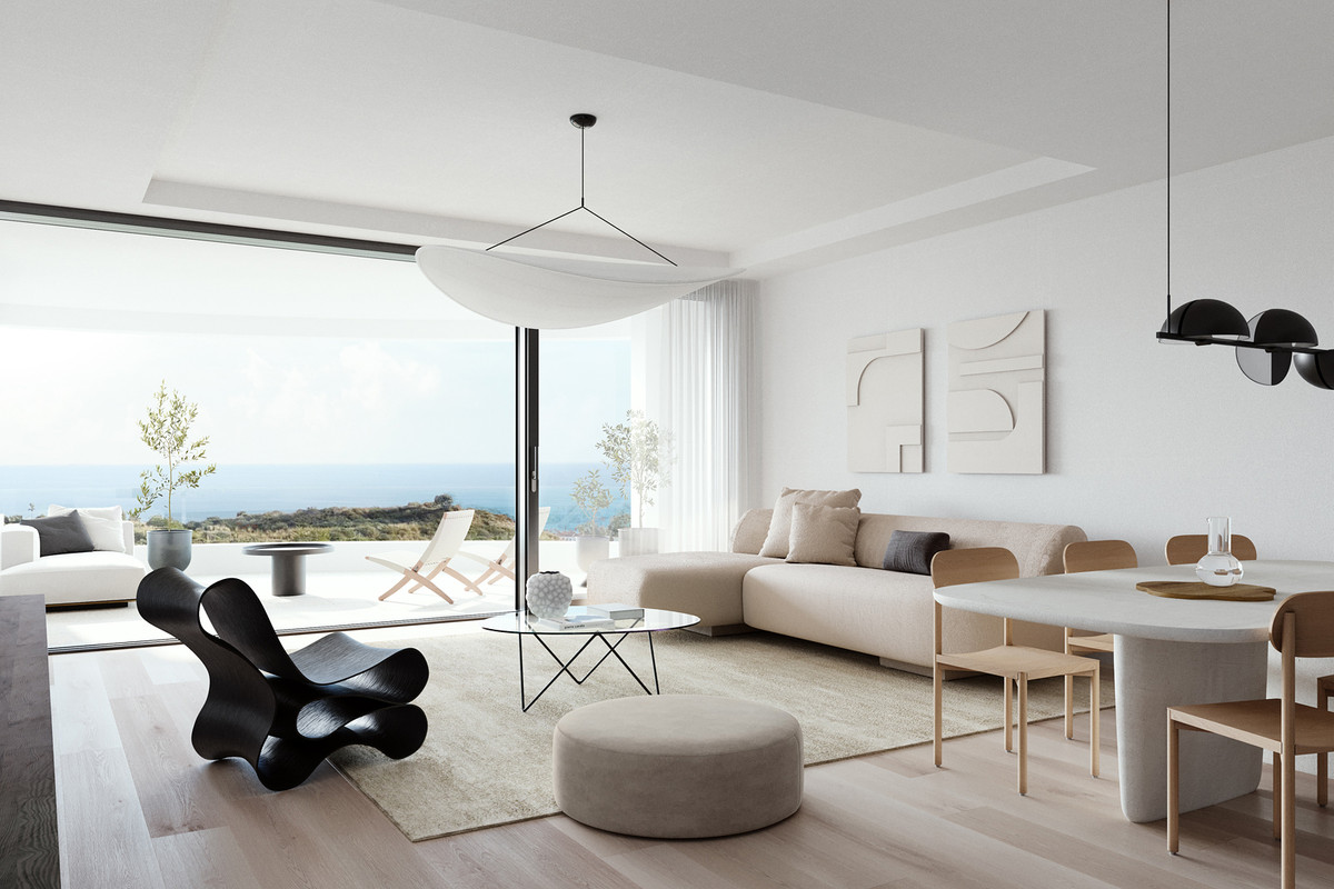Interiørvisualisering med beige sofa, mørk lænestol og rund puf ved et lyst spisebord; brede glasskydedøre åbner mod terrassen. Møblerne er ikke en bekræftet inventarliste.